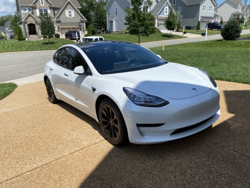 Tesla Model 3 in a driveway